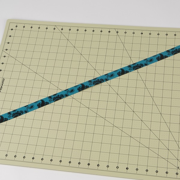 Double sided strip of Duck Tape created by folding a piece of tape over itself